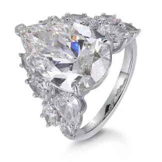 Pear-Shaped Cluster Engagement Ring with Surrounding Moissanite