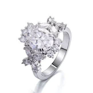 Oval Nebula Cluster Ring | Oval-Cut Moissanite Center with Orbital Micro-Gem Halo in Frame​