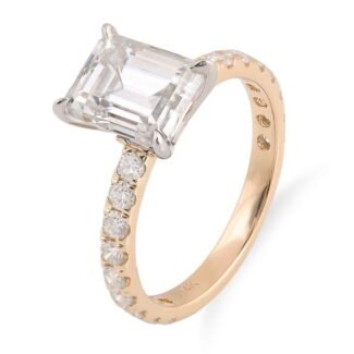 emerald cut moissanite solitaire ring with eternity pave band