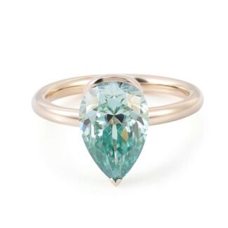 Pear cut bezel green moissanite ring