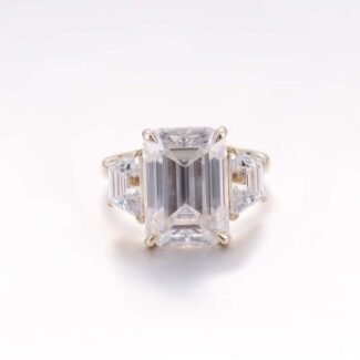 Emerald Cut Moissanite Ring with Trapezoid Cut Side Stones on Cathedral Band