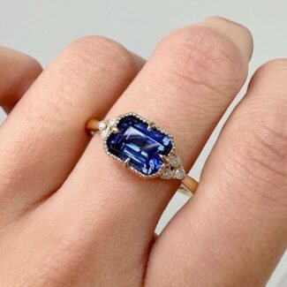 Classic Emerald Cut blue Sapphire engagement ring